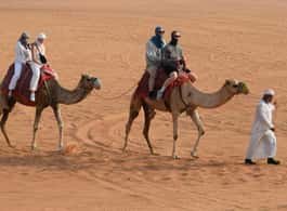 Dubai: Desert Safari, Quad Bike, Camel Ride and Sandboarding side 2