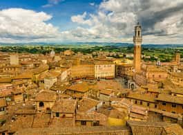 Florence: Day Trip with Free Time in San Gimignano and Siena side 1